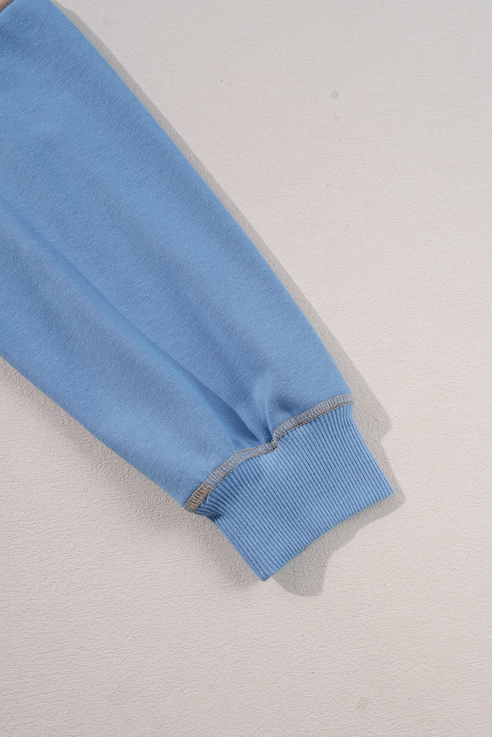 Heaven Blue Haggy Haggy Swetshirt y detalles acanalados