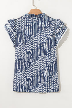 Blue blouse with abstract print *