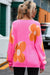 Pull ample à motif floral *