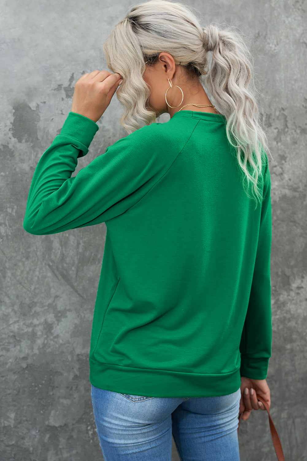 Plain green crew neck sweatshirt with raglan sleeves