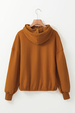 Brown zip-up hoodie with kangaroo pocket and ribbed trim