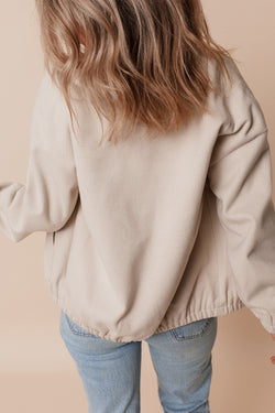 Beige bomber jacket with pockets and baseball collar