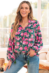 Green blouse with puffy sleeves and tied collar with floral print *