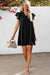 Vestido recto negro con volantes *