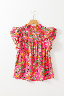 Flied fluffed summer blouses and pink floral print