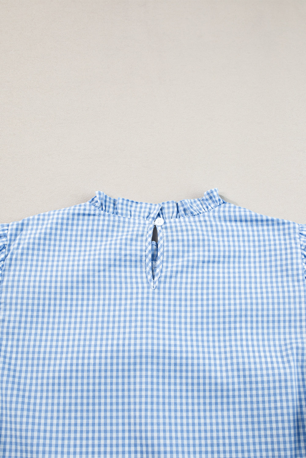 Hellblau Gingham Blumenbluse bestickte Puffhülle