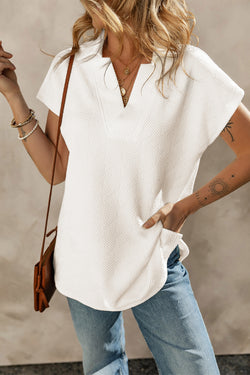 White textured high with short sleeves and V -neck