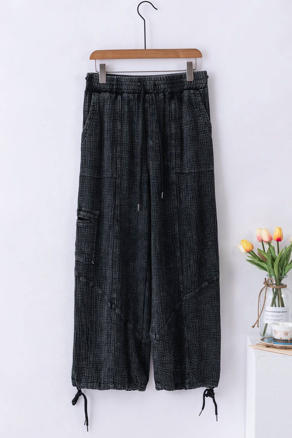 Black textured mineral wash wide leg pants with drawstring