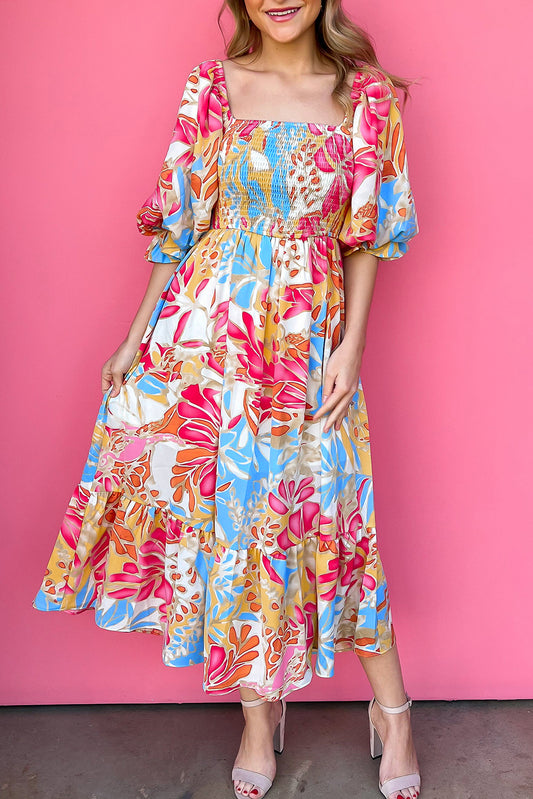 Robe longue à manches bouffantes et corsage smocké à imprimé tropical rose rouge