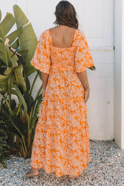 Robe longue smockée à imprimé floral orange*