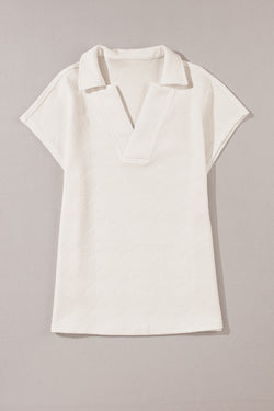 White textured high with short sleeves and V -neck