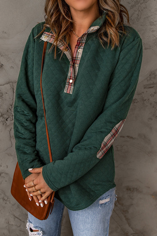 Green sweatshirt with geometric texture and plaid border