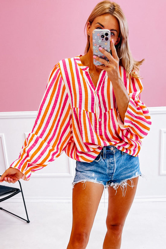 Orange striped blouse, balloon sleeves, notched v collar, buttoned on the front