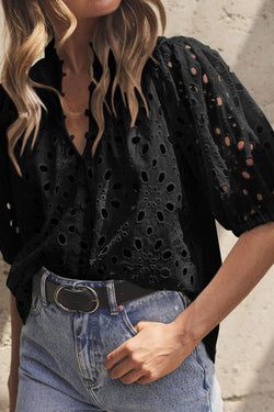 Black blouse with puffy sleeves *