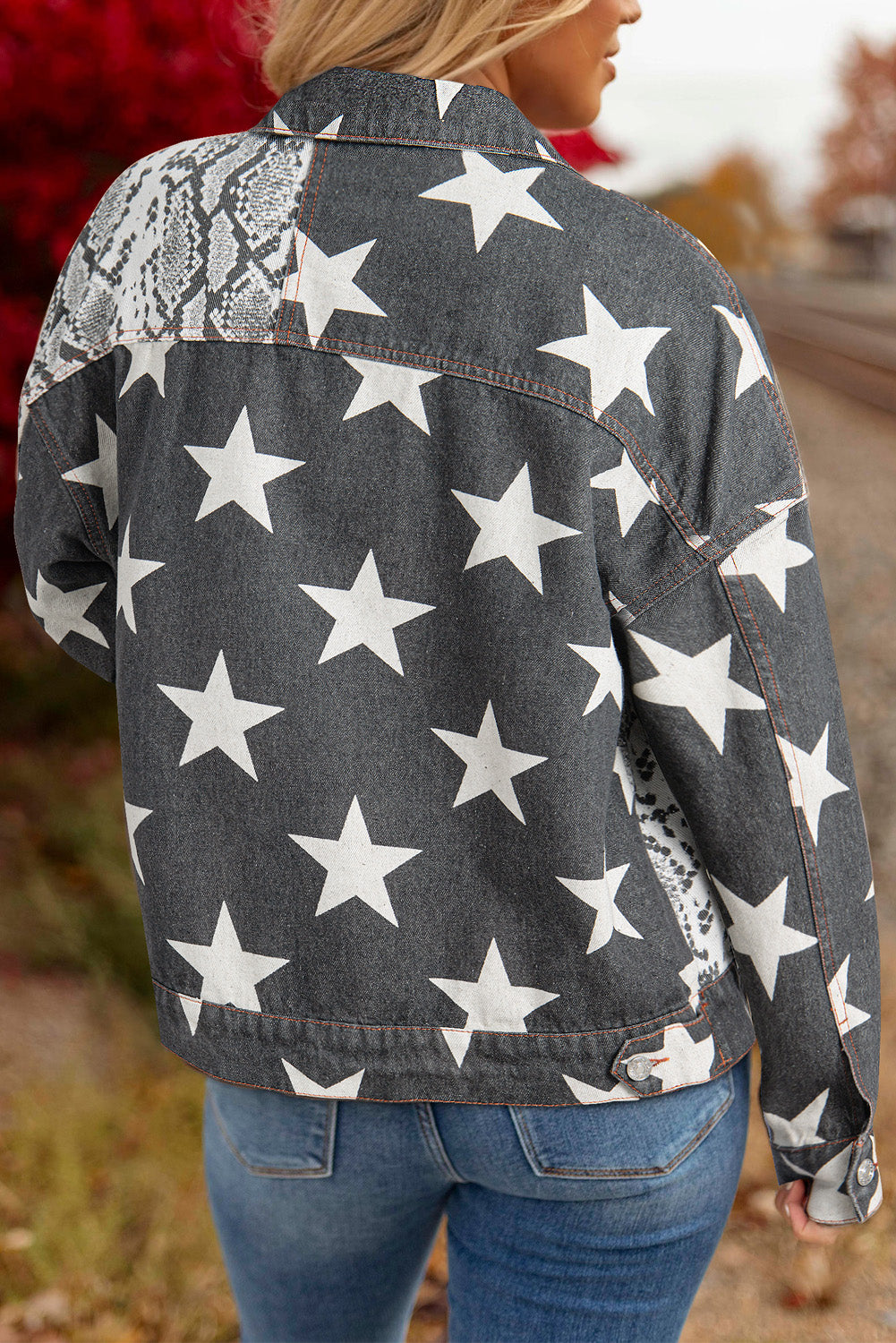 Black snakeskin print patchwork denim jacket with star