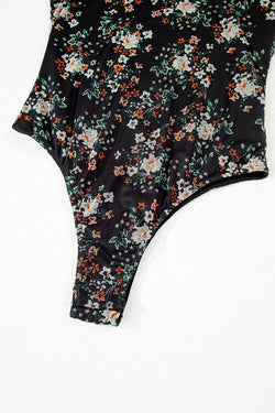 Body noir à imprimé floral, col en U, manches courtes bouffantes