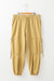 Beige high waisted drawstring fitted band pants