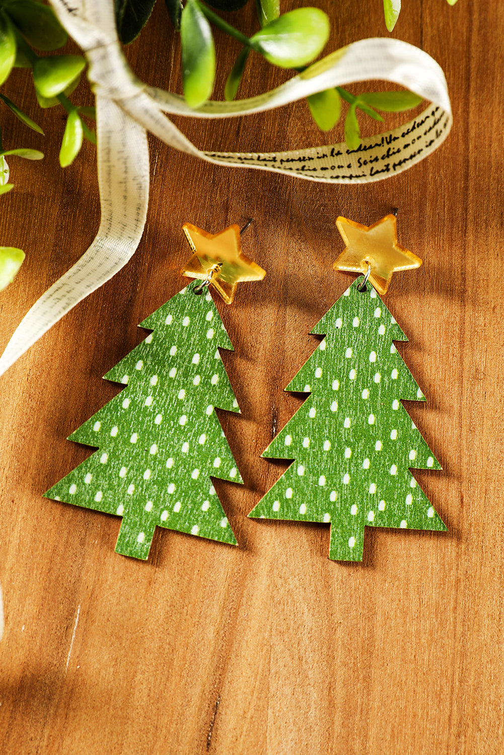 Boucles d'oreilles pendantes de Noël à imprimé pois verts