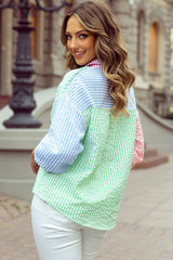 Chemise ample boutonnée à manches ballon et rayures roses-A WOMAN WE LOVE