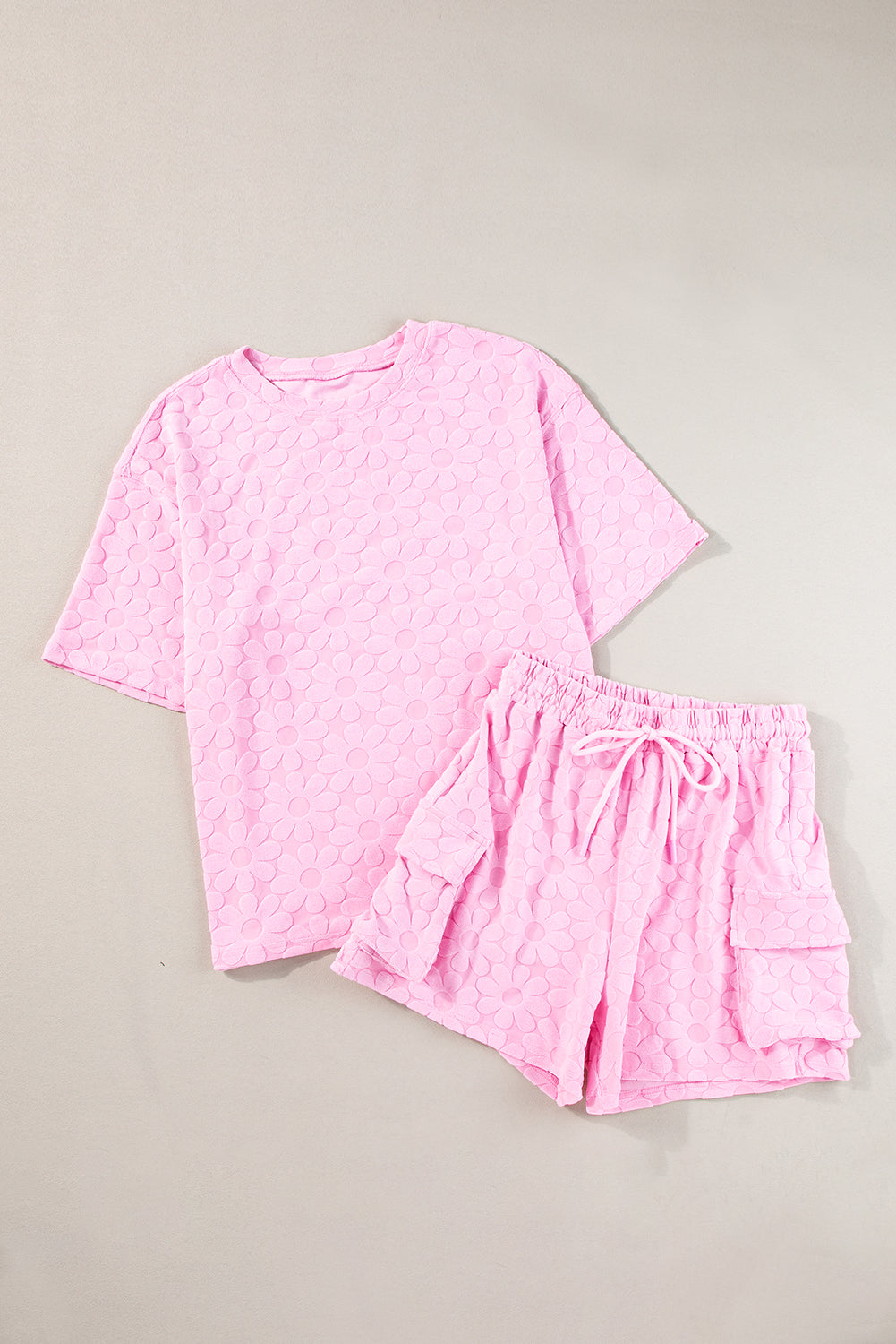 Top a manicotto corto con testura floreale rosa e shorts set