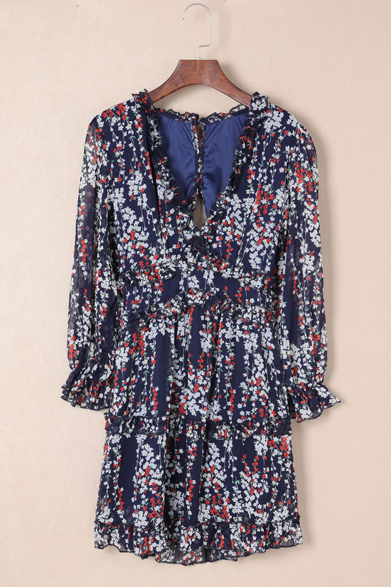 Blue floral dress with ruffles and open back