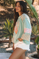 Gran alto con mangas largas claramente gráfico de corazón de paz floral a cuadros aqua