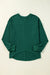 Ample blouse with long sleeves and blackish robe green v for drooping shoulders