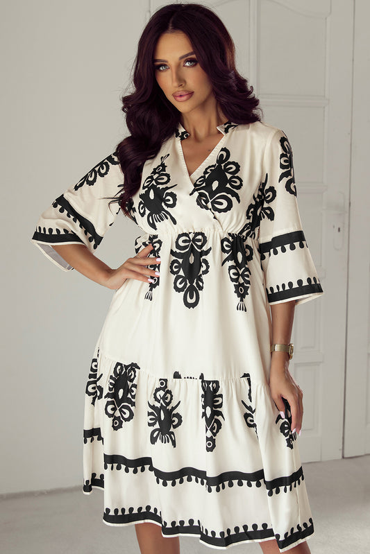 Beige loose midi dress with western geometric print and 3/4 sleeves