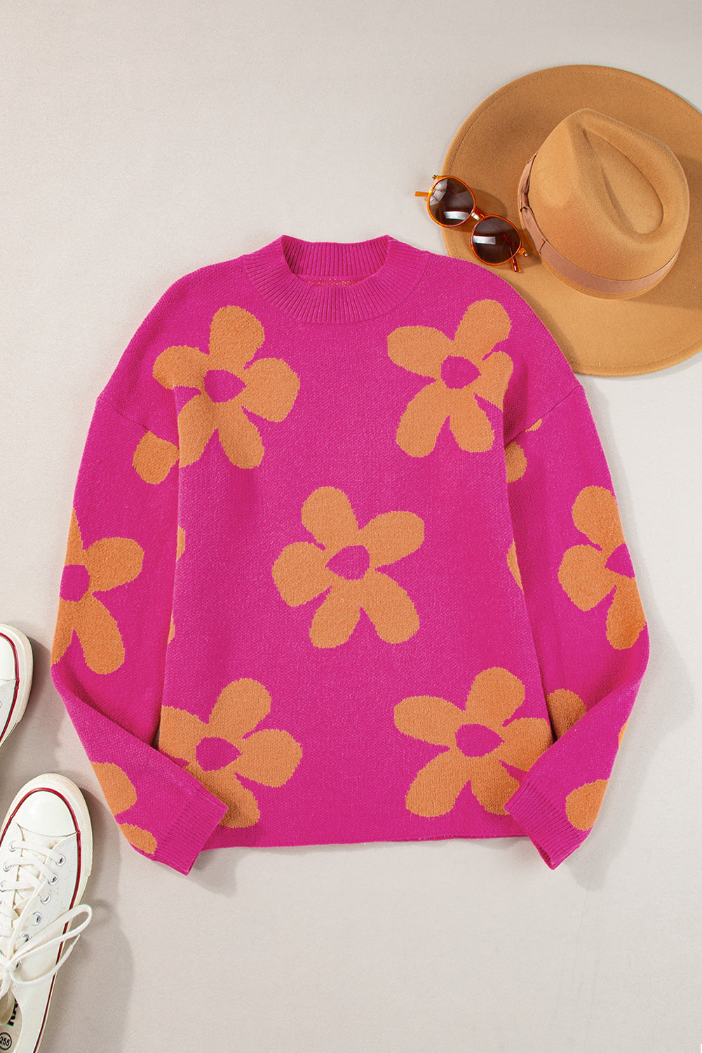 Long sleeve, high neck sweater with large pink flower pattern