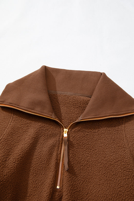 Brown half-zip fleece sweatshirt