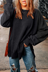 Sweat-shirt oversize noir à épaules tombantes et bordure côtelée