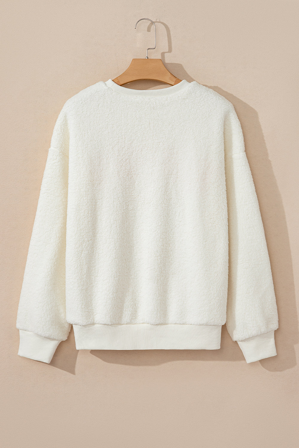 Sudadera sherpa howdy beige en parches