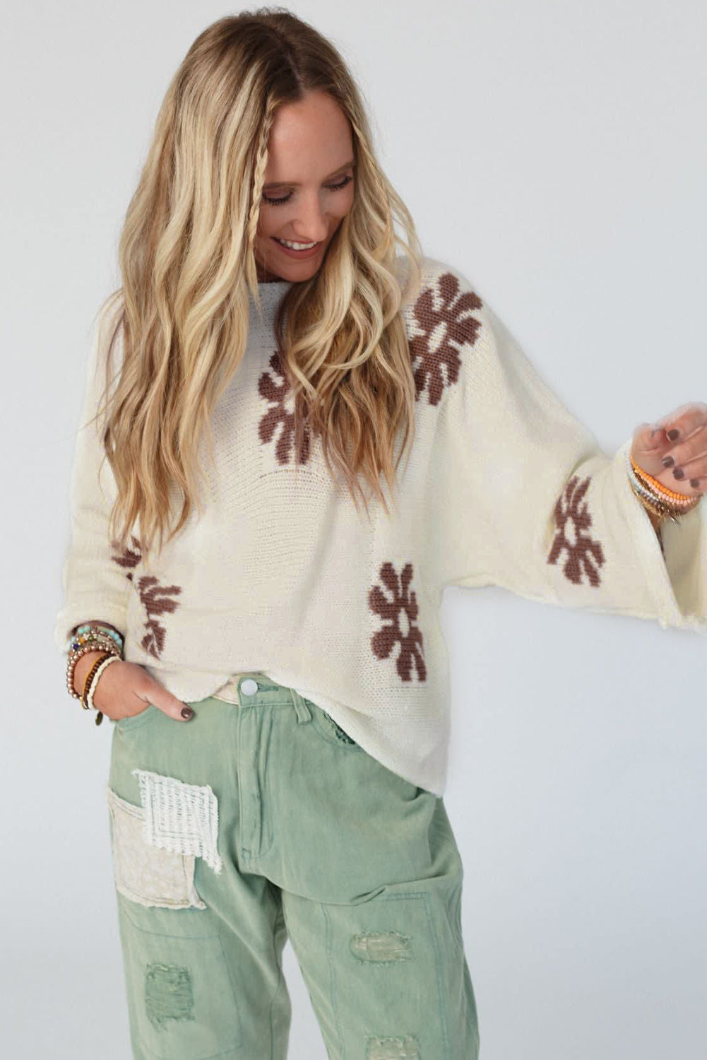 White round-neck sweater with color block floral pattern