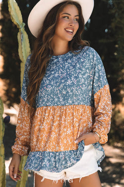 Blusa naranja con flores y bloques de color *