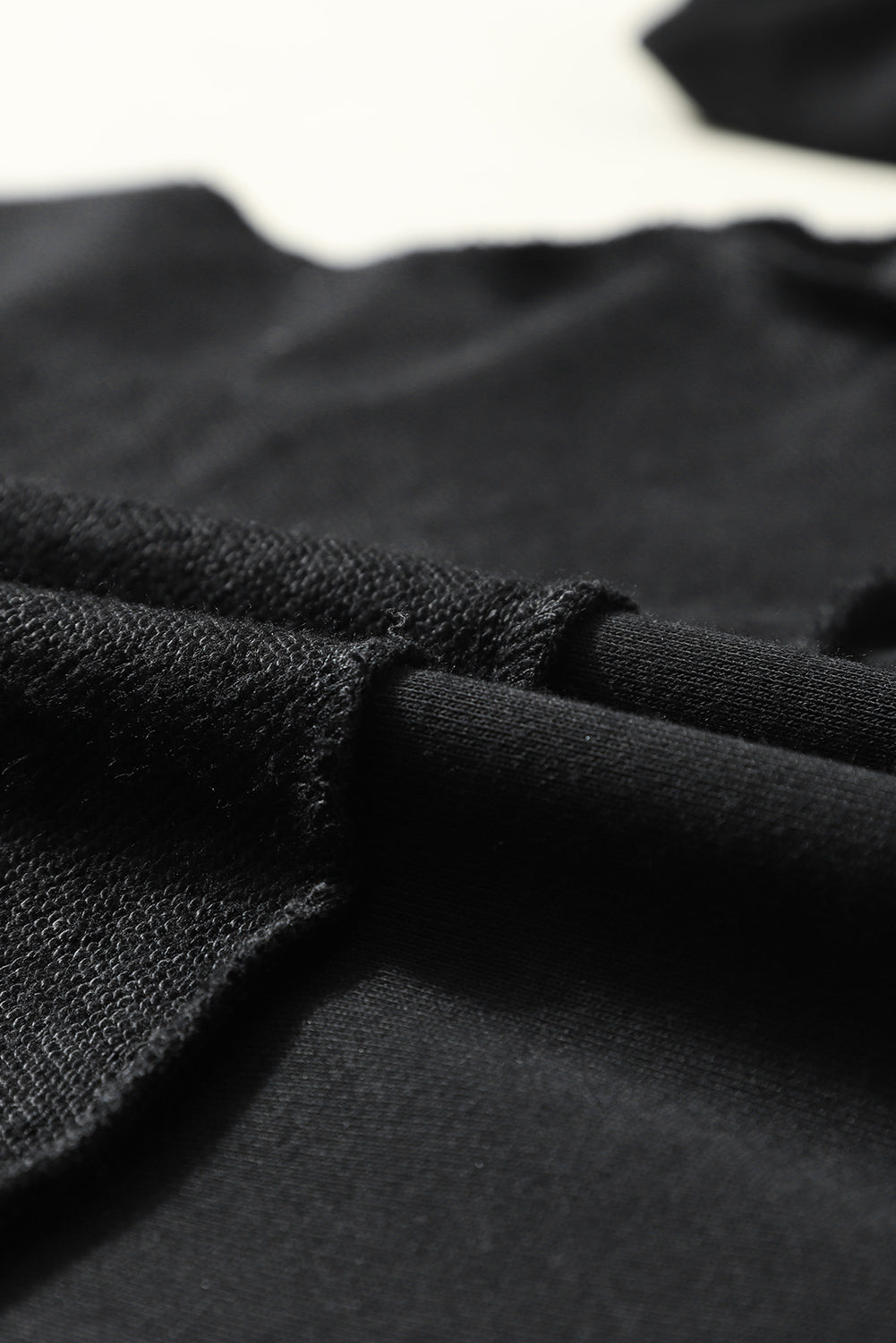 Sweat-shirt noir à épaules tombantes et boutons Henley