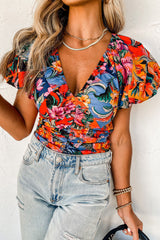 Chemisier orange imprimé floral à manches bouffantes et col en V froncé-A WOMAN WE LOVE