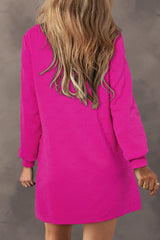 Mini-robe droite texturée en jacquard rouge rose avec fermeture éclair sur un quart