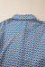 Surprised shirt buttoned with frowned and abstract blue sky