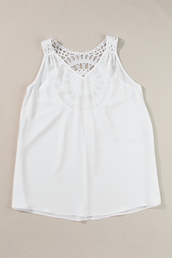 Sleeveless white tunic *