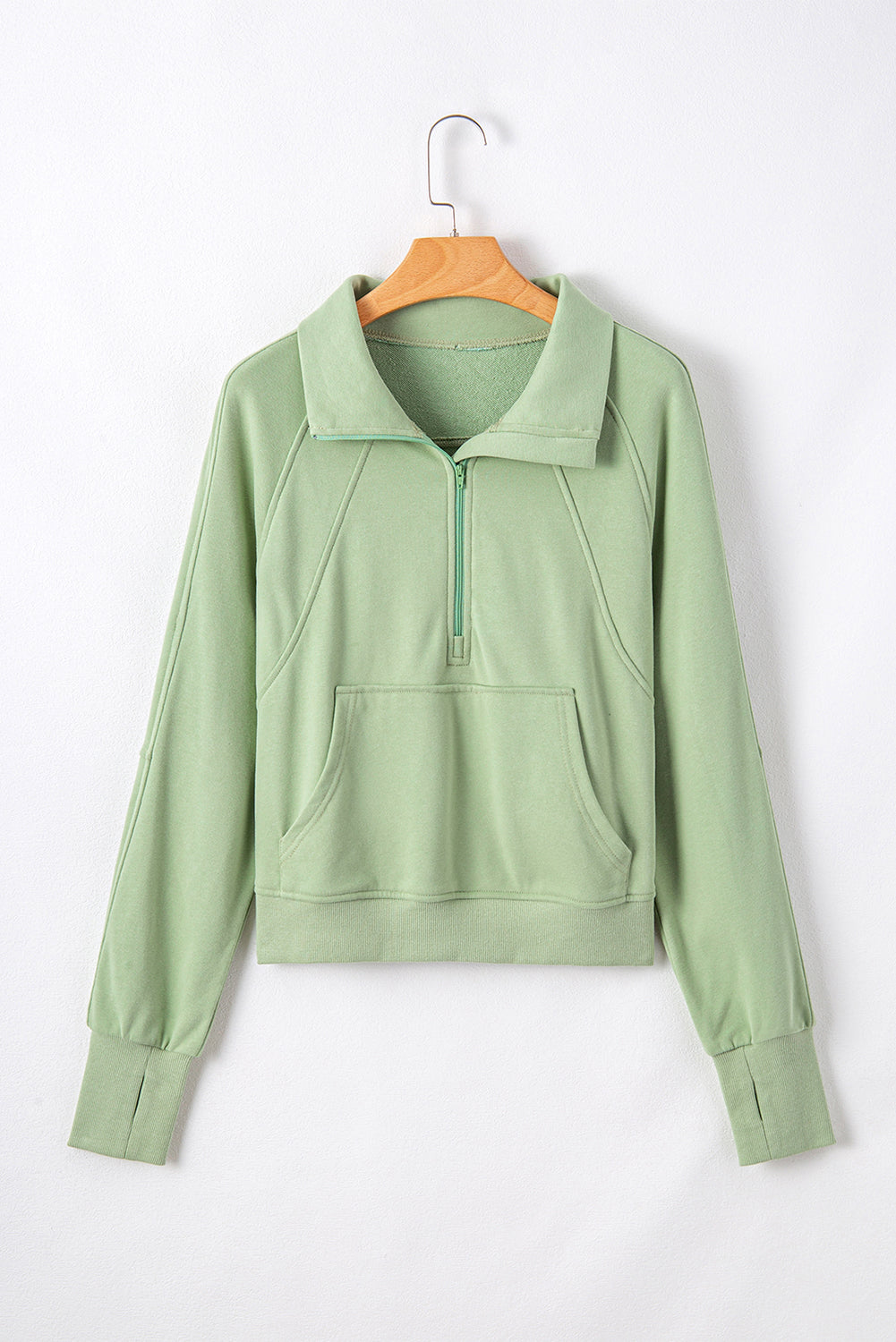 Smoke green sweatshirt with kangaroo pocket and stand-up collar with quarter zip