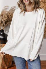 Sudadera holgada blanca con hombro caído y mosaicos lisos