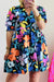 Vestido azul con cuello dividido y flores