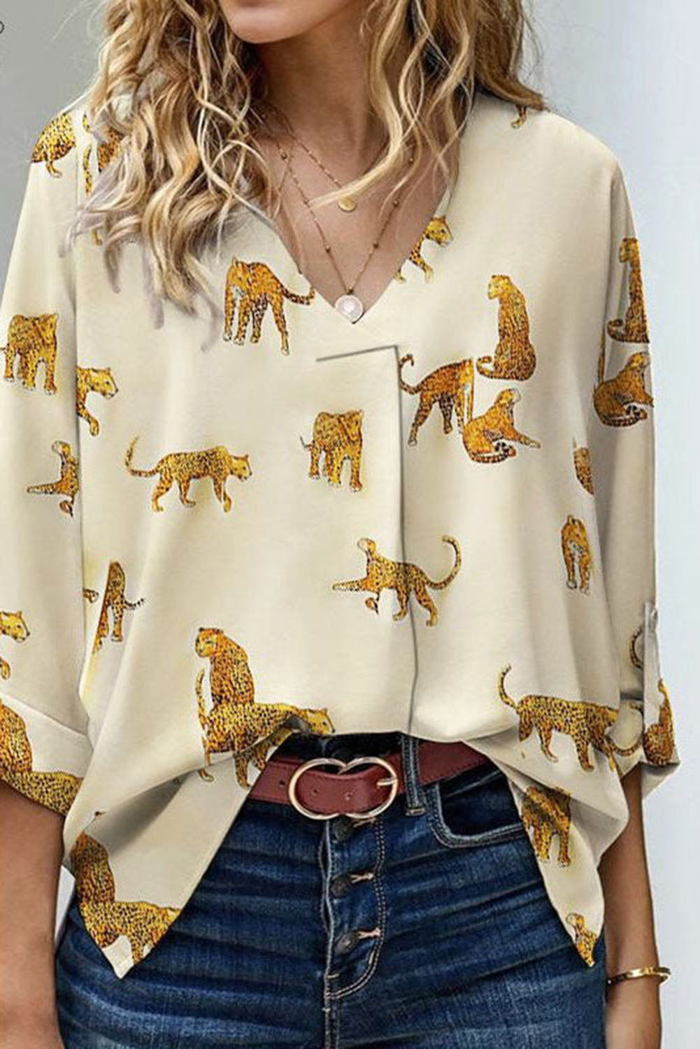 Tabla de estampado de leopardo impreso en albaricoque Manga suelta V blusa con cuello