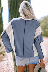 Haut ample haut bas bleu Ashleigh avec détails en crochet et coutures apparentes
