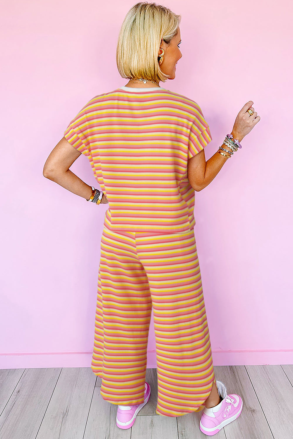 Wide leg pants set with yellow striped rainbow t-shirt and fringed string