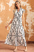 Long white dress with ruffles and V -collar with an abstract vein print