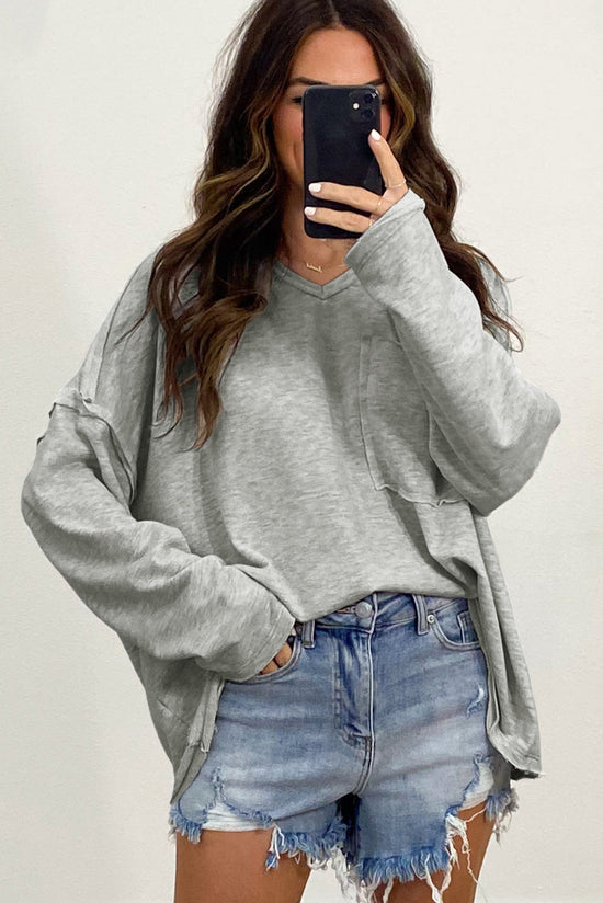 Grey oversized top with pockets and dropped sleeves