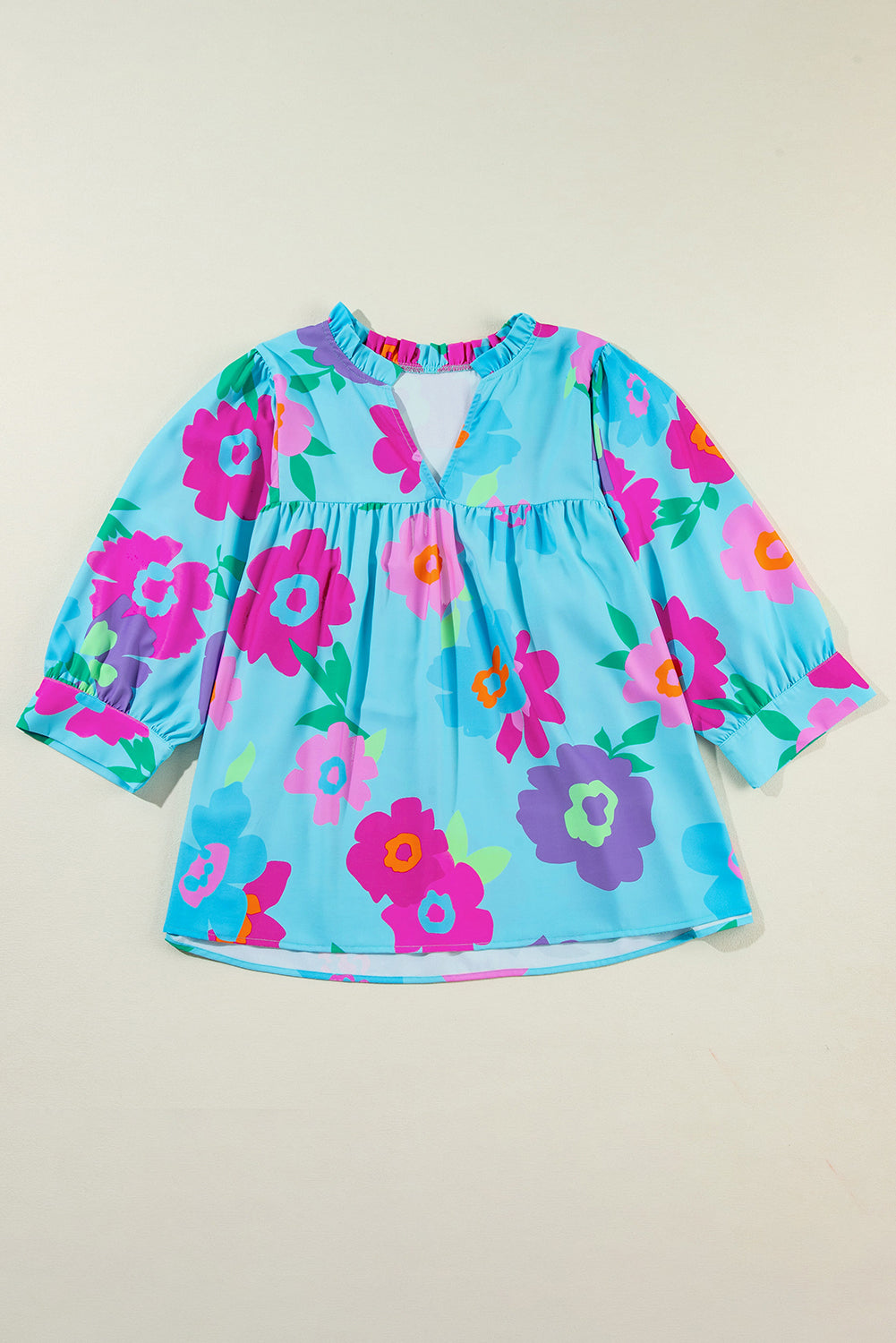 Babydoll blouse with floral print and tight -sized V -shaped V -neck light