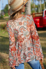 Chemisier orange à imprimé floral et col en V *-A WOMAN WE LOVE