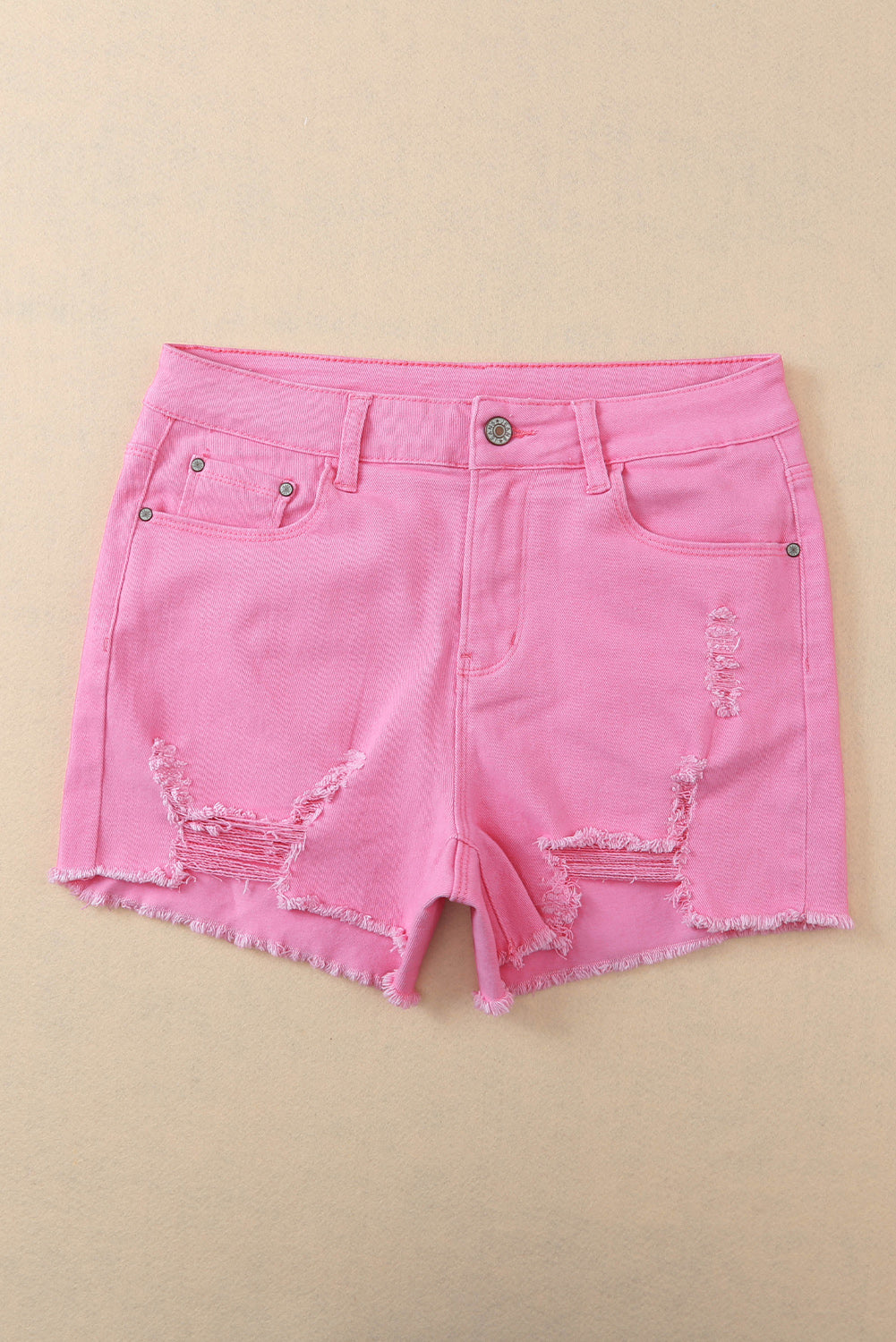 Shorts en denim en détresse de couleur unie rose